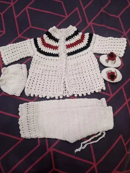 Cherished Charm: Handcrafted Crochet Baby Frock Set with Matching Shoe and Cap Ensemble